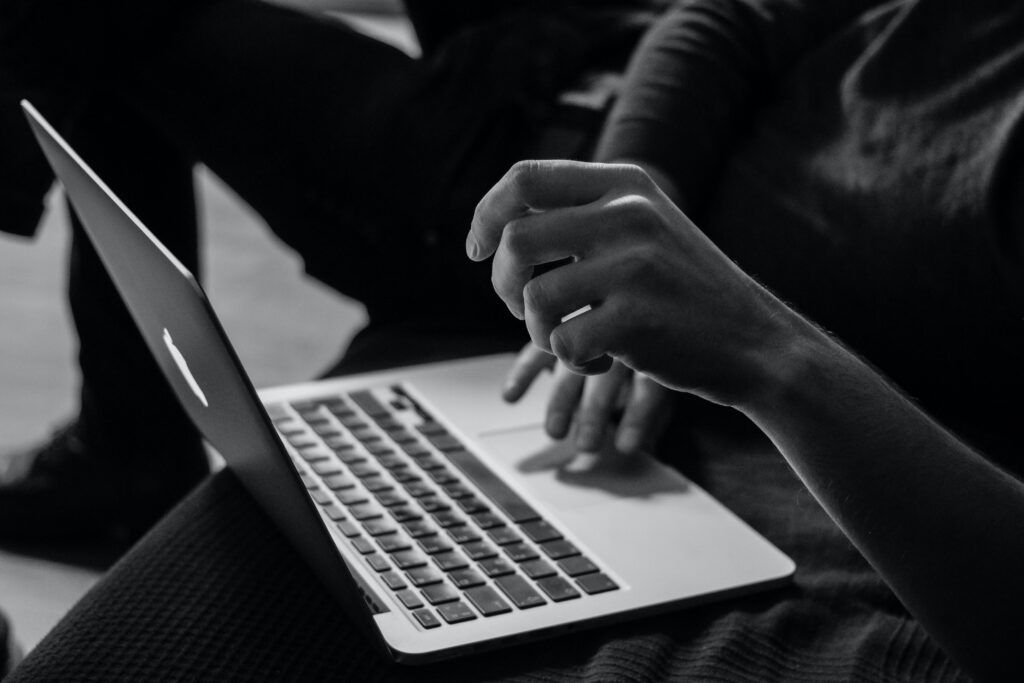 Man typing on a computer